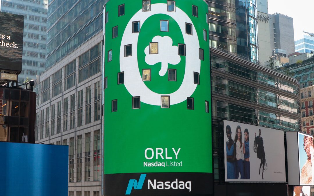 A picture of Times Square with O'Reilly Auto Parts' stock symbol, ORLY, displayed.
